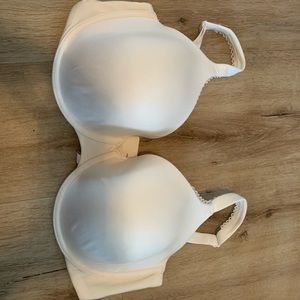 Victoria secret white bra with lace around cup.